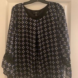 AGB blouse. Beautiful sleeves and unique pattern.